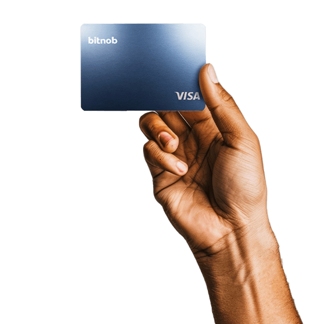Hand with Bitnob Visa Card
